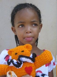 South African recipient of mother bear project
